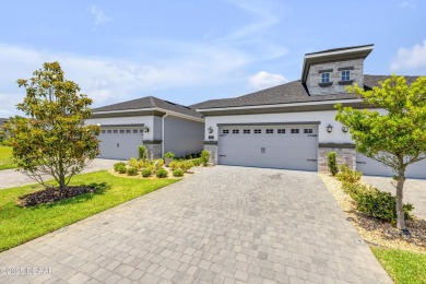 Step into refined elegance with this meticulously maintained on Plantation Bay Golf and Country Club in Florida - for sale on GolfHomes.com, golf home, golf lot