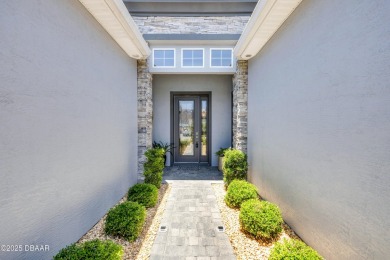 Step into refined elegance with this meticulously maintained on Plantation Bay Golf and Country Club in Florida - for sale on GolfHomes.com, golf home, golf lot