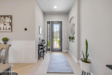 Step into refined elegance with this meticulously maintained on Plantation Bay Golf and Country Club in Florida - for sale on GolfHomes.com, golf home, golf lot