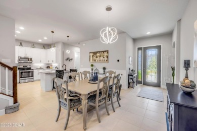 Step into refined elegance with this meticulously maintained on Plantation Bay Golf and Country Club in Florida - for sale on GolfHomes.com, golf home, golf lot