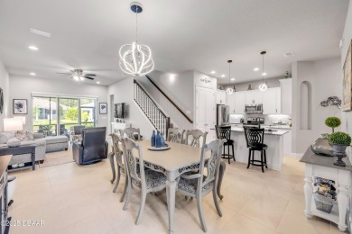 Step into refined elegance with this meticulously maintained on Plantation Bay Golf and Country Club in Florida - for sale on GolfHomes.com, golf home, golf lot
