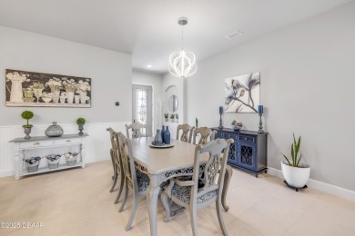 Step into refined elegance with this meticulously maintained on Plantation Bay Golf and Country Club in Florida - for sale on GolfHomes.com, golf home, golf lot