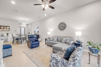 Step into refined elegance with this meticulously maintained on Plantation Bay Golf and Country Club in Florida - for sale on GolfHomes.com, golf home, golf lot