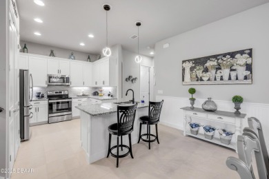 Step into refined elegance with this meticulously maintained on Plantation Bay Golf and Country Club in Florida - for sale on GolfHomes.com, golf home, golf lot