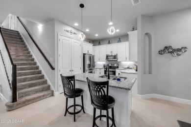 Step into refined elegance with this meticulously maintained on Plantation Bay Golf and Country Club in Florida - for sale on GolfHomes.com, golf home, golf lot