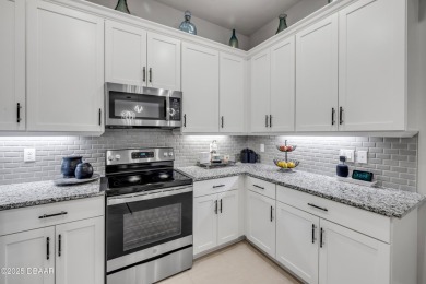 Step into refined elegance with this meticulously maintained on Plantation Bay Golf and Country Club in Florida - for sale on GolfHomes.com, golf home, golf lot
