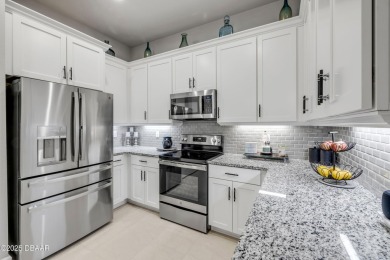 Step into refined elegance with this meticulously maintained on Plantation Bay Golf and Country Club in Florida - for sale on GolfHomes.com, golf home, golf lot