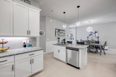 Step into refined elegance with this meticulously maintained on Plantation Bay Golf and Country Club in Florida - for sale on GolfHomes.com, golf home, golf lot