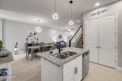 Step into refined elegance with this meticulously maintained on Plantation Bay Golf and Country Club in Florida - for sale on GolfHomes.com, golf home, golf lot