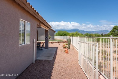 Welcome to this stunning and charming home in the Villas at on Verde Santa Fe Golf Club in Arizona - for sale on GolfHomes.com, golf home, golf lot