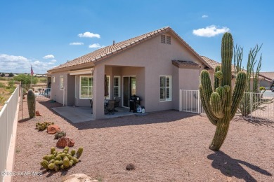 Welcome to this stunning and charming home in the Villas at on Verde Santa Fe Golf Club in Arizona - for sale on GolfHomes.com, golf home, golf lot
