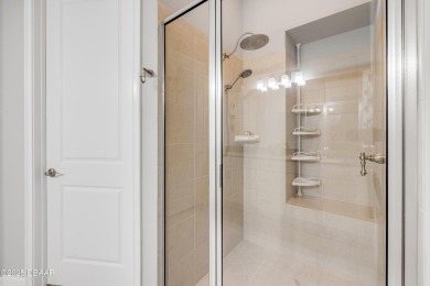 Step into refined elegance with this meticulously maintained on Plantation Bay Golf and Country Club in Florida - for sale on GolfHomes.com, golf home, golf lot