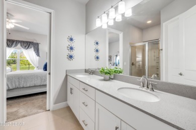 Step into refined elegance with this meticulously maintained on Plantation Bay Golf and Country Club in Florida - for sale on GolfHomes.com, golf home, golf lot