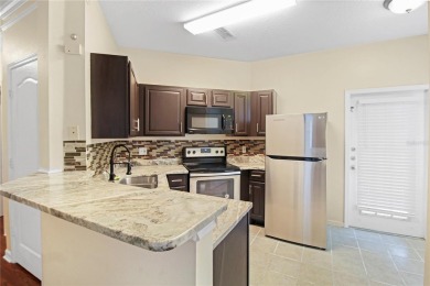Beautifully Remodeled 3-Bedroom, 2-Bath First-Floor Condo in New on Heritage Isles Golf and Country Club in Florida - for sale on GolfHomes.com, golf home, golf lot