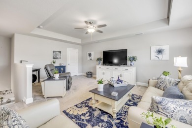 Step into refined elegance with this meticulously maintained on Plantation Bay Golf and Country Club in Florida - for sale on GolfHomes.com, golf home, golf lot