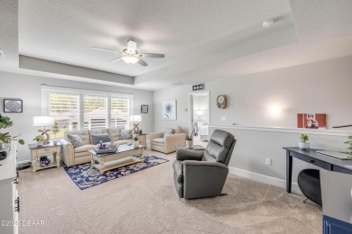 Step into refined elegance with this meticulously maintained on Plantation Bay Golf and Country Club in Florida - for sale on GolfHomes.com, golf home, golf lot