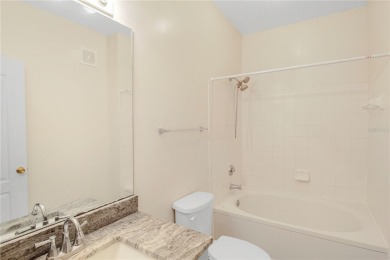 Beautifully Remodeled 3-Bedroom, 2-Bath First-Floor Condo in New on Heritage Isles Golf and Country Club in Florida - for sale on GolfHomes.com, golf home, golf lot