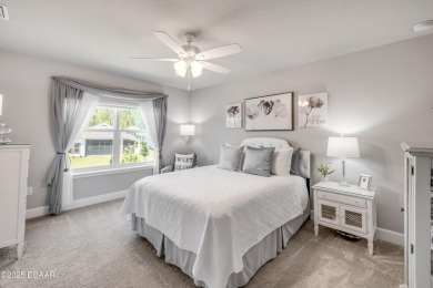 Step into refined elegance with this meticulously maintained on Plantation Bay Golf and Country Club in Florida - for sale on GolfHomes.com, golf home, golf lot