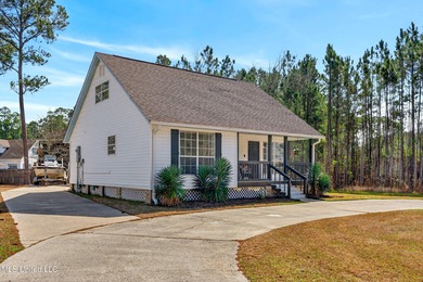 Fully renovated and thoughtfully designed in Timber Ridge, this on Pass Christian Isles Golf Club in Mississippi - for sale on GolfHomes.com, golf home, golf lot