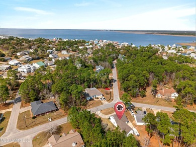 Fully renovated and thoughtfully designed in Timber Ridge, this on Pass Christian Isles Golf Club in Mississippi - for sale on GolfHomes.com, golf home, golf lot