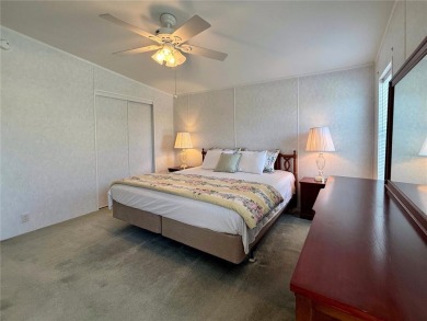 WELCOME to this spacious home in the resort-style 55+ on Apollo Beach Golf and Sea Club in Florida - for sale on GolfHomes.com, golf home, golf lot