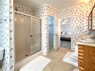WELCOME to this spacious home in the resort-style 55+ on Apollo Beach Golf and Sea Club in Florida - for sale on GolfHomes.com, golf home, golf lot