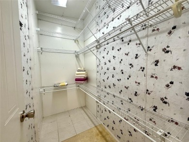 WELCOME to this spacious home in the resort-style 55+ on Apollo Beach Golf and Sea Club in Florida - for sale on GolfHomes.com, golf home, golf lot