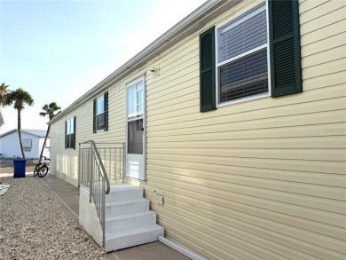 WELCOME to this spacious home in the resort-style 55+ on Apollo Beach Golf and Sea Club in Florida - for sale on GolfHomes.com, golf home, golf lot