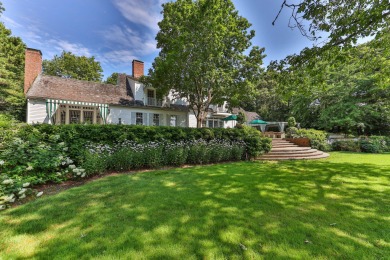 High on a hill overlooking the verdant rolling landscape of one on Oyster Harbors Club in Massachusetts - for sale on GolfHomes.com, golf home, golf lot