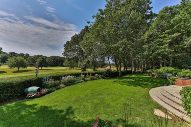 High on a hill overlooking the verdant rolling landscape of one on Oyster Harbors Club in Massachusetts - for sale on GolfHomes.com, golf home, golf lot