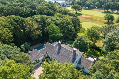 High on a hill overlooking the verdant rolling landscape of one on Oyster Harbors Club in Massachusetts - for sale on GolfHomes.com, golf home, golf lot