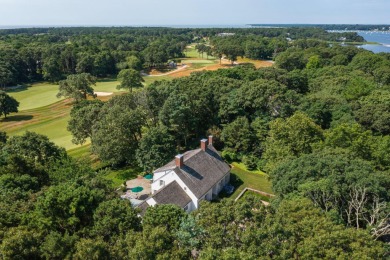 High on a hill overlooking the verdant rolling landscape of one on Oyster Harbors Club in Massachusetts - for sale on GolfHomes.com, golf home, golf lot