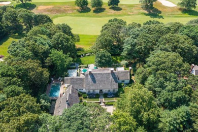 High on a hill overlooking the verdant rolling landscape of one on Oyster Harbors Club in Massachusetts - for sale on GolfHomes.com, golf home, golf lot