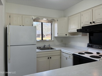 First floor unit on the Golf Course. New outlets, hardware on Diamondhead Country Club in Mississippi - for sale on GolfHomes.com, golf home, golf lot