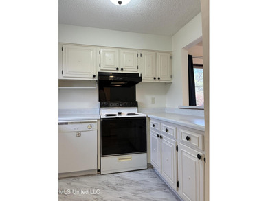 First floor unit on the Golf Course. New outlets, hardware on Diamondhead Country Club in Mississippi - for sale on GolfHomes.com, golf home, golf lot