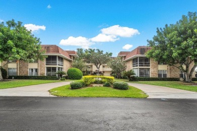 Wonderful First Floor 2 bedroom 2 bath end unit condo with on BallenIsles Golf and Country Club in Florida - for sale on GolfHomes.com, golf home, golf lot