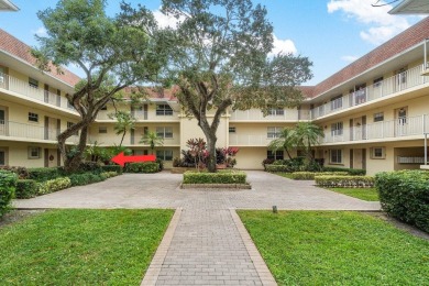 Wonderful First Floor 2 bedroom 2 bath end unit condo with on BallenIsles Golf and Country Club in Florida - for sale on GolfHomes.com, golf home, golf lot