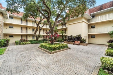 Wonderful First Floor 2 bedroom 2 bath end unit condo with on BallenIsles Golf and Country Club in Florida - for sale on GolfHomes.com, golf home, golf lot