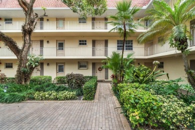 Wonderful First Floor 2 bedroom 2 bath end unit condo with on BallenIsles Golf and Country Club in Florida - for sale on GolfHomes.com, golf home, golf lot