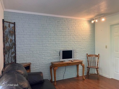 GREAT INVESTMENT PROPERTY. Nicely updated, on a quiet cul-de-sac on Diamondhead Country Club in Mississippi - for sale on GolfHomes.com, golf home, golf lot