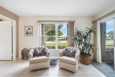 Wonderful First Floor 2 bedroom 2 bath end unit condo with on BallenIsles Golf and Country Club in Florida - for sale on GolfHomes.com, golf home, golf lot