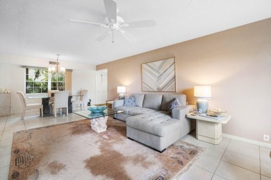 Wonderful First Floor 2 bedroom 2 bath end unit condo with on BallenIsles Golf and Country Club in Florida - for sale on GolfHomes.com, golf home, golf lot