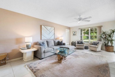 Wonderful First Floor 2 bedroom 2 bath end unit condo with on BallenIsles Golf and Country Club in Florida - for sale on GolfHomes.com, golf home, golf lot