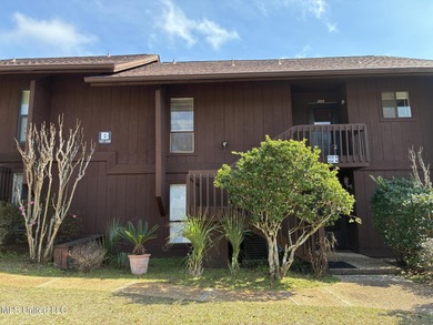 Two bedroom condo on the golf course with a deck and great views on Diamondhead Country Club in Mississippi - for sale on GolfHomes.com, golf home, golf lot