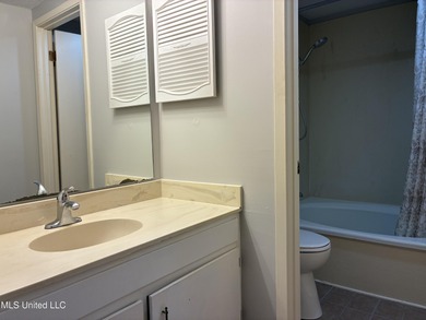 Two bedroom condo on the golf course with a deck and great views on Diamondhead Country Club in Mississippi - for sale on GolfHomes.com, golf home, golf lot