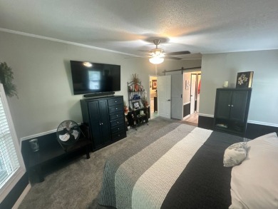 This completely remodeled, stucco Palm Harbor home is located on on Del Tura Golf and Country Club in Florida - for sale on GolfHomes.com, golf home, golf lot