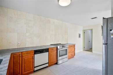 Welcome to your dream home! This beautiful 3-bedroom, 2 on The Grand Club - Pine Lakes Course in Florida - for sale on GolfHomes.com, golf home, golf lot