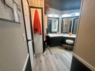 This completely remodeled, stucco Palm Harbor home is located on on Del Tura Golf and Country Club in Florida - for sale on GolfHomes.com, golf home, golf lot