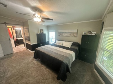 This completely remodeled, stucco Palm Harbor home is located on on Del Tura Golf and Country Club in Florida - for sale on GolfHomes.com, golf home, golf lot