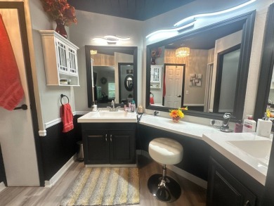 This completely remodeled, stucco Palm Harbor home is located on on Del Tura Golf and Country Club in Florida - for sale on GolfHomes.com, golf home, golf lot